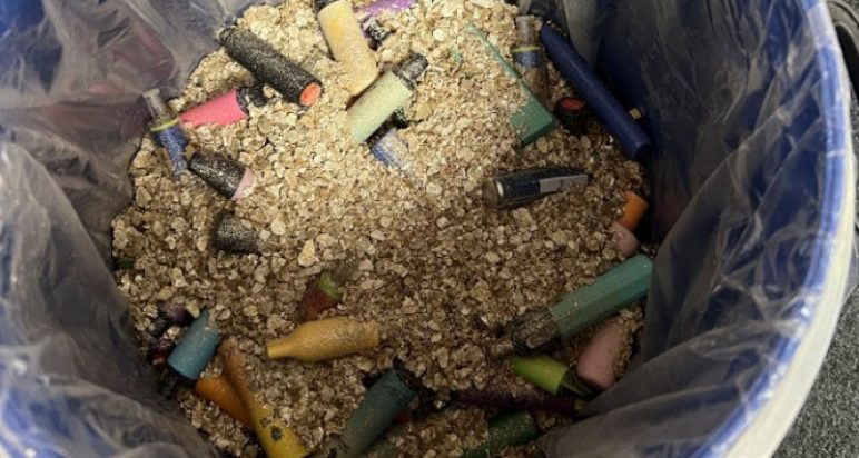 Image of filled recycling drum with vermiculite
